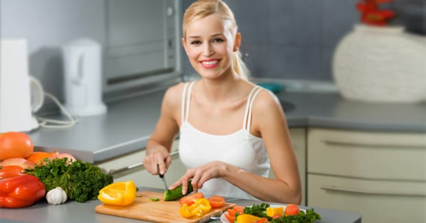 Picture of a lady cutting vegetables