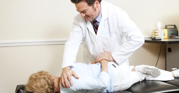 Chiropractor treating patient for Fibromyalgia